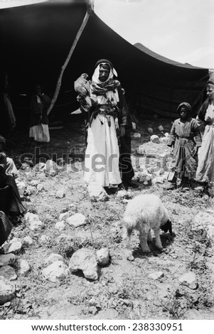 Bedouin hunter with his falcon and child, Jerusalem, photograph by American Colony Photo Department, circa 1898-1946
