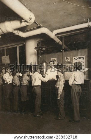 Employees lined up at the lunch counter, postal office, Broadway, New York, New York, July, 1910.