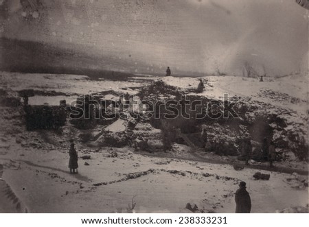 Siberia, prison guards surrounding a placer mine at Kara, Transbaikalia, where hard labor convicts are working, original title: \'Convicts working in a placer mine\', photograph, 1885-1886.