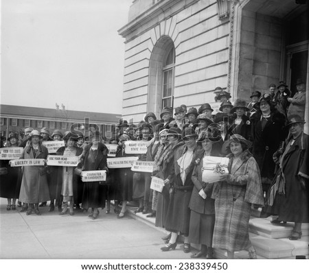 Prohibition, women from New Jersey at the Capitol to a prohibition hearing, holding signs \'Know your courts Study your politicians\', \'Liberty in Law\', and \' Character in candidates\', April 12, 1926.
