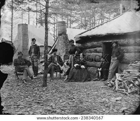 The Civil War, officers and a lady at headquarters of 1st Brigade, Horse Artillery, Brandy Station, Virginia, photograph, February, 1864.