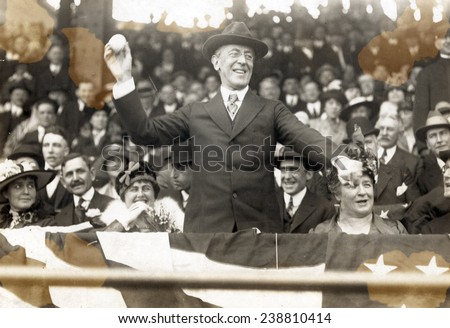 President Woodrow Wilson throwing out the first ball, opening day, 1916