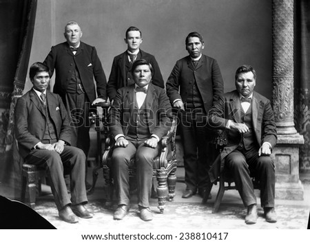 Nez Perce delegates with Benjamin Beveridge (left, standing), owner of Washington House, Washington, DC. ca. 1880