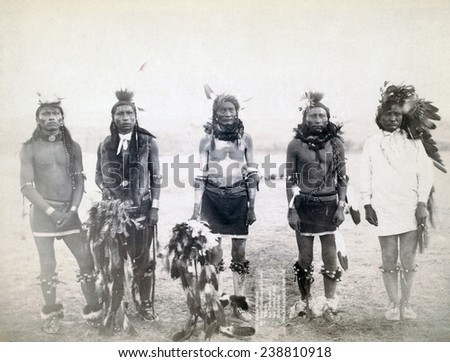 Five Grass dancers. Mr. Bear-that-Runs-and-Growls, Mr. Warrior, Mr. One-Tooth-Gone, Mr. Sole, Mr. Make-it-Long, on or near Cheyenne River Reservation, South Dakota. Photo by John C. Grabill. 1890