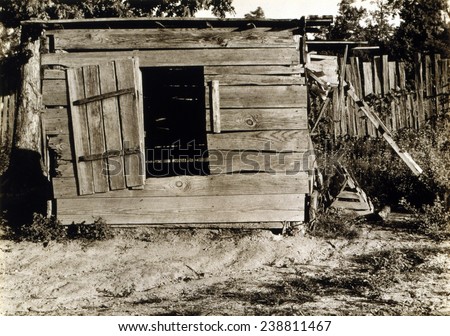 Chicken coop on the farm of Floyd Burroughs, cotton sharecropper, Hale County, Alabama. Published in the book, \'Let Us Now Praise Famous Men\'. photograph by Walker Evans, 1936.