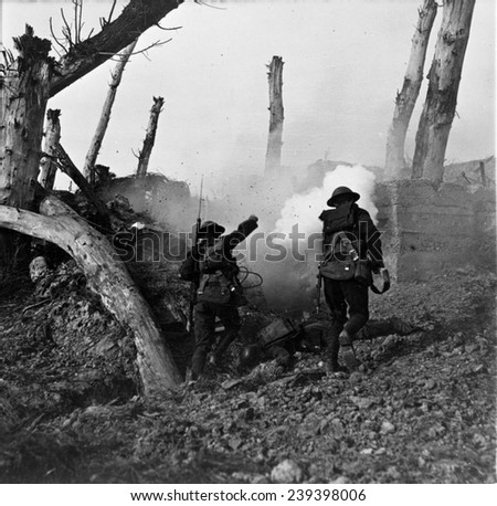Three American soldiers viewed from behind, near ruins, original caption reads: \'At close grips with the Hun, we bomb the corkshaffer\'s\', circa 1910s.