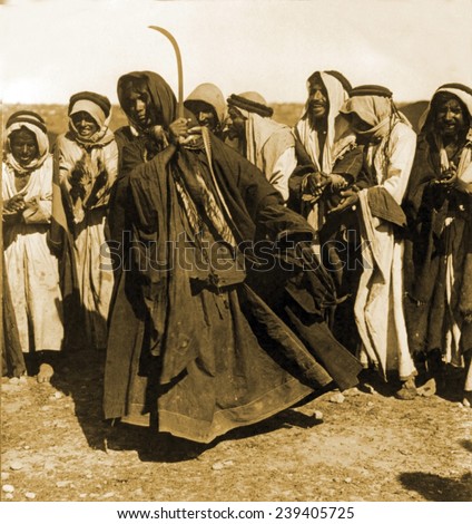 Bedouin maiden performing traditional sword dance. Palestine, 1919.