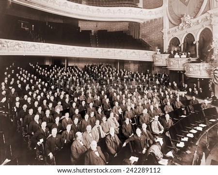 American Bankers pose for a group portrait in a theater during their Association Convention at Milwaukee, 1901.