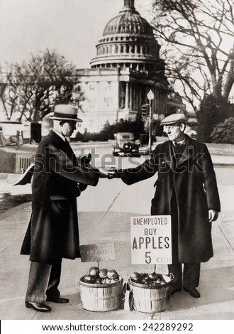 The Great Depression. Unemployed man sells apples near the Capitol in Washington D.C. As the Great Depression deepened in 1930, obtained apples from the International Apple Shippers Association. 1930