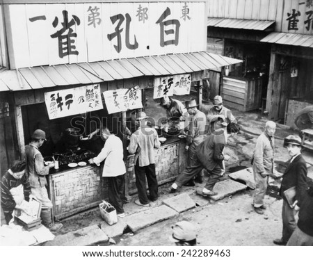 Food stall in post-World War II Tokyo has customers, but no rice. As late as the mid-1950\'s, Japan\'s economy was still recovering from defeat. Jan. 1954.