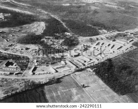 Greenbelt, Maryland, first model community planned by New Deal\'s programs authorized by the Federal Emergency Relief Act, signed on May 12. 1933, Photo of the completed housing taken in March 1937.