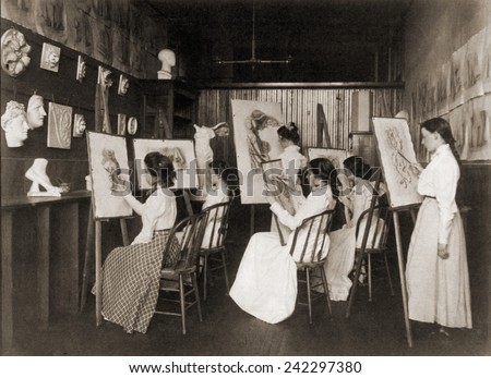 Six girls in art a high school art class drawing plaster casts of classical sculpture. 19th century art training immersed students in classical aesthetics. 1899.