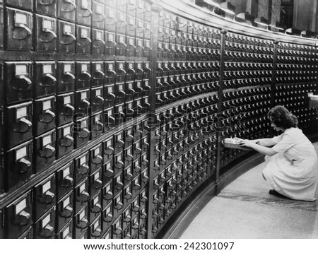 Woman using the card catalog at the Main Reading Room of the Library of Congress, ca. 1940.