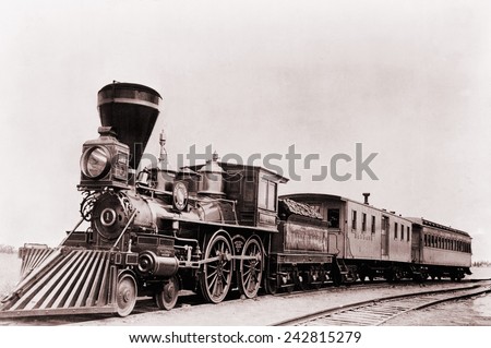 \'William Crooks\' a 1861 locomotive of the Great Northern Railway with tender and cars. The tender is a special car to carry fuel and water to keep the locomotive running.
