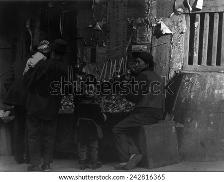 TOY MERCHANTS. Chinese immigrants in San Francisco. From Arnold Genthe\'s CHINATOWN SERIES. Ca. 1900.
