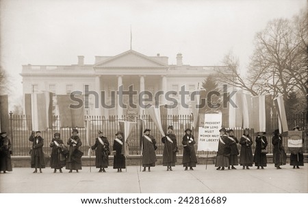 National Women\'s Party demonstration in front of the White House in 1918. The banner protests Wilson\'s failure to support women\'s suffrage.