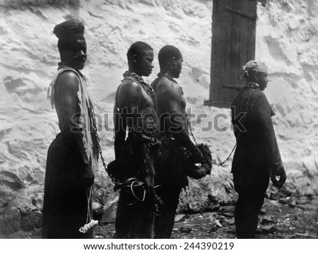 Chain gang of convicts in Monrovia Liberia. Ca. 1895.