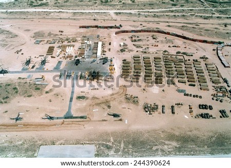 Base of the U.N. mostly U.S. Marine Forces in Somalia was built on an abandoned Soviet airfield in Mogadishu. Had a wall of shipping containers upper right to thwart random sniper fire. Feb. 25 1993.