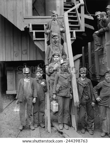 Dust covered Breaker Boys at the Woodward Coal Mines, Kingston, Pennsylvania. The youngest coal mine workers started at this dirty, unskilled work. C. 1900.