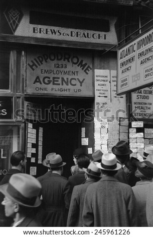 Crowd of job seekers at the Hippodrome Employment Agency at 1235 Sixth Avenue. New York City Dec. 1937.