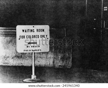 Sign reading \'waiting room for colored only, by order Police Dept.\' Ca. 1940s or 1950s.