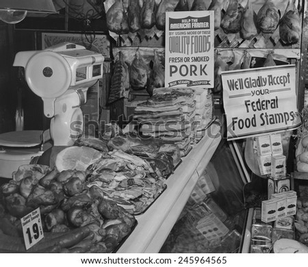 Food Market display welcoming Food Stamps made available to Americans on relief from 1939 to 1943. The first Food Stamp program was initiated by Sec. of Agriculture Henry Wallace.