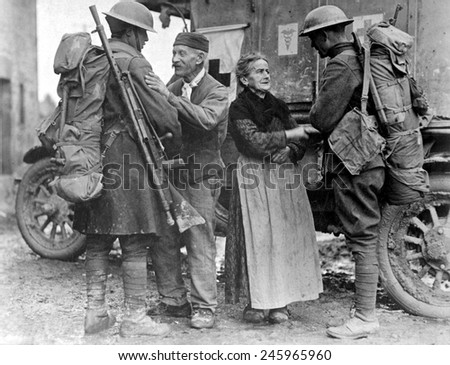 M. and Mme. Baloux of Brieulles-sur-Bar, France, endured German occupation for four years, greeting American soldiers in the last days of WWI. Nov. 6, 1918.