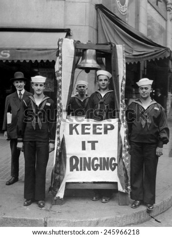 Fourth Liberty Loan Campaign during WWI. Sailors with a model of the Liberty Bell and a sign \'Keep It Ringing\'. Seattle, Washington. 1918.