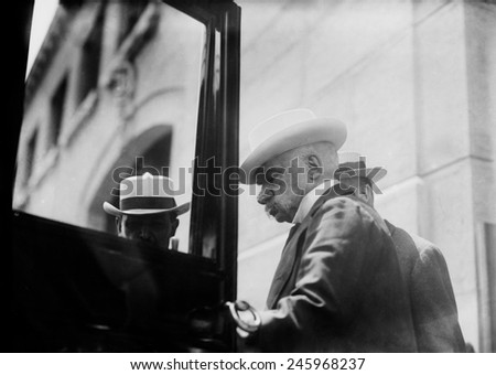 J.P. Morgan 1837-1913 American banker and financier entering a car. Ca. 1910.