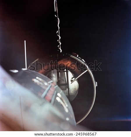 Gemini 8 spacecraft approaching the Agena Target Docking vehicle. The mission conducted the first docking of two spacecraft in orbit. March 16, 1966.