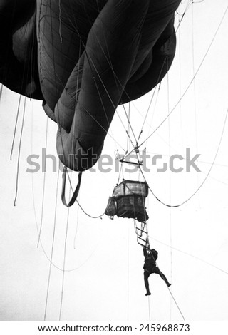 WWI aerial Naval observer coming down from a 'Blimp' type balloon after U-Boat scouting somewhere on the U.S. Atlantic Coast. Ca. 1918.