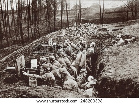 World War 1. German machine guns in a trench near Darkehmen in East Prussia. A wounded soldier receives medical attention. Possibly during either the 1914 or 1916 Russian invasion of East Prussia.