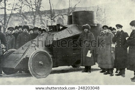 Petrograd City Militia replaced the Czarist police during Russian Revolution. 1917. They were a temporary police force formed by volunteers, who in this case commandeered an armored car.