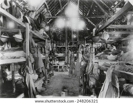 Barracks of WW1 American soldiers in France. July 19, 1918. The 305th M.P. Train, Company A, were billeted in a old wood building in Beauval, France.