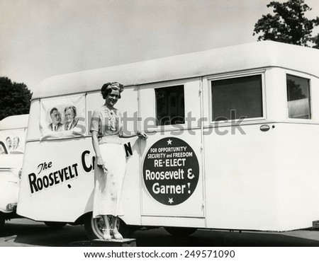 Roosevelt Caravan trailer traveled the country in the 1936 Presidential Election. Female campaign worker promotes election of the Roosevelt-Garner ticket. Aug. 21, 1936.