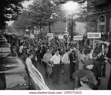 WPA workers protest lay-offs in Washington, D.C. Aug. 24, 1937. Some of the over 2000 dismissed WPA workers marching to the White House, Capitol, and Harry Hopkins' office.