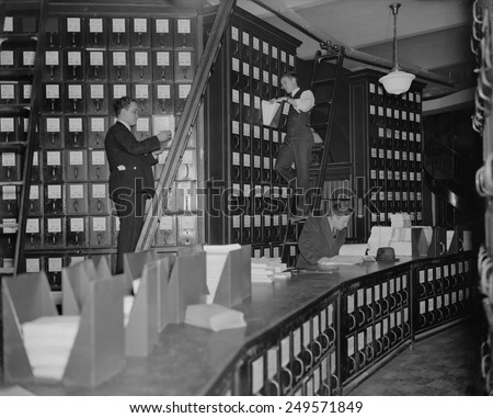 Clerks working in Capitol Document Room where all bills were kept on file, Nov. 9, 1937.