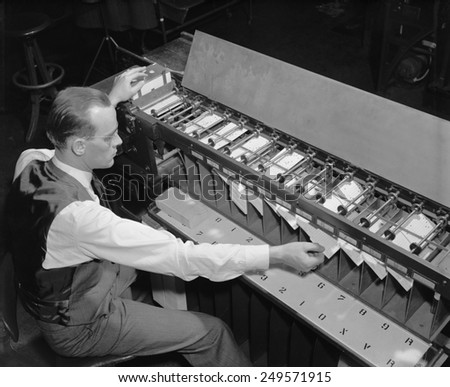 U.S. Bureau of the Census computer operator at a punch card sorter, ca. 1940.