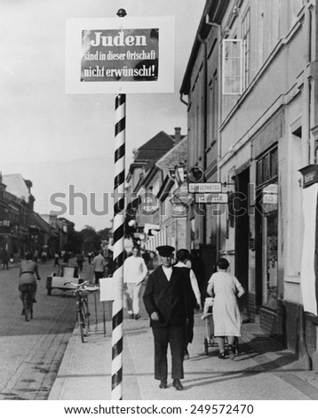 Anti-Semitic message in a Schwedt, Germany commercial district, 1935. 'Juden sind in dieser Ortschaft nicht erwunscht!' translates to 'Jews not wanted'.