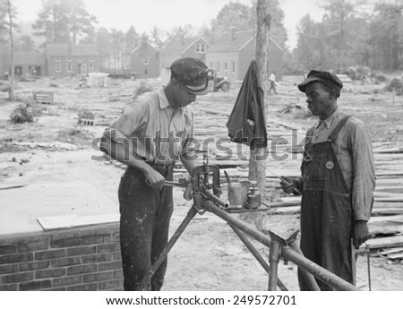 Builders at Newport News Homesteads, Virginia, Sept. 1936. Subsidized by the New Deal Resettlement Administration.