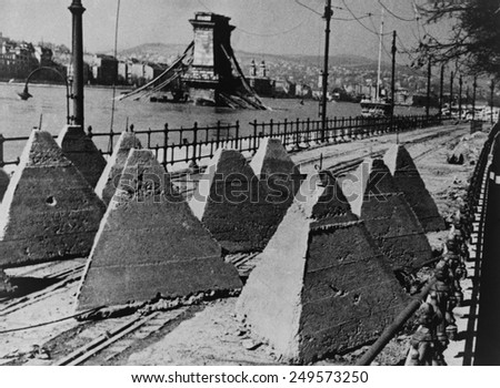 WW2 anti-tank barriers along the river in Budapest. Retreating Germans and Hungarian forces destroyed the Chain Bridge as Soviet forces took the city. Feb. 1944 photo by Yevgeny Khaldei.