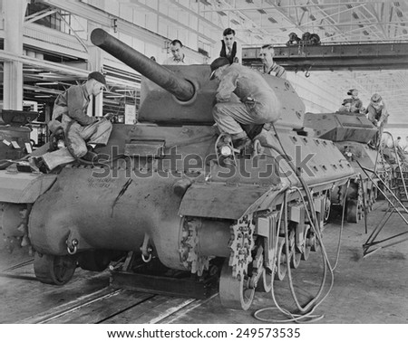 M-10 tanks in production on General Motors assembly line. American passenger cars were produced in very small numbers during World War 2.