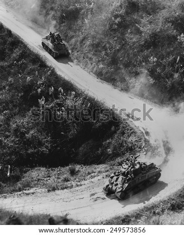 Allied Tanks use the Burma Road for the first time in two years in Jan. 1945. Also called the \'Ledo Road\', it was the only overland supply route to China during World War 2.