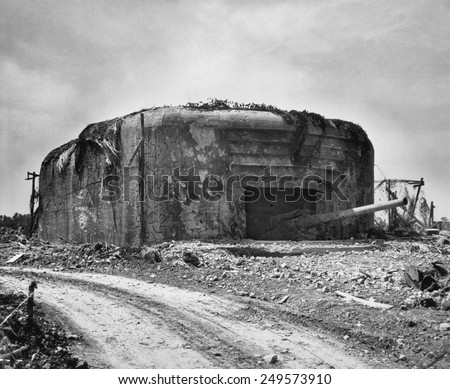 German gun emplacement had concrete walls 13 feet thick and four 10 1/4 inch guns. This position was taken out of action by Allied aerial bombing. June 1944 World War 2.