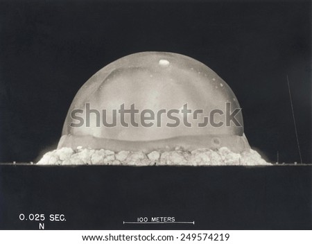 First Atomic Explosion on July 16, 1945. Photograph taken at .025 seconds after the Trinity initial detonation shows a plasma dome. Manhattan Project, World War 2. Alamogordo, New Mexico.