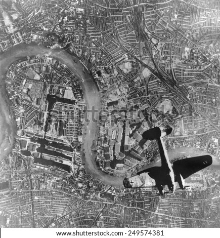 German Heinkel 111 bomber over London. Below is the River Thames and Tower Bridge. German photo taken Sept. 7, 1940 during first days of World War 2.