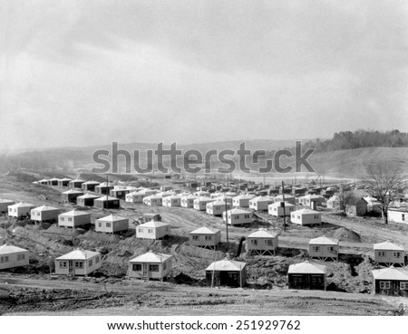 Small and simple homes under construction in Oak Ridge, Tennessee. Ca. 1945. They are for workers of the Manhattan Project's Clinton Engineering Works.