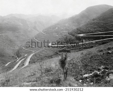 The Burma Road between Kinming and Kweiyung, China. June 1944. The winding road over mountains was the only overland supply route to China during World War 2.