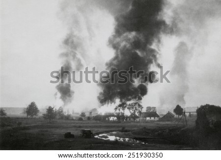 Russian village in flames during the German invasion of the Soviet Union. Summer 1941, retreating Russian armies often destroyed all infrastructure that could be used by the advancing Nazi invaders.