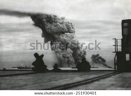 Smoke from a merchant ship bombed in an Allied convoy to the Soviet Union (Russia).October 1942.